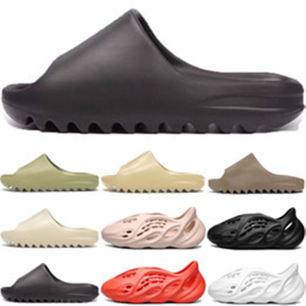 designer slipper sandals mens womens slippers beach resin bone soil brown fashion slippers foam shoes triple black white orange with box and
designer slipper sandals mens womens slippers beach resin bone soil brown fashion slippers foam shoes triple black white orange with box and