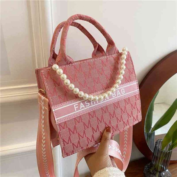 large capacity tote bag women's 2022 printed pearl accessories single shoulder trend messenger female cosmetic bags for women ladies
large capacity tote bag women's 2022 printed pearl accessories single shoulder trend messenger female cosmetic bags for women ladies