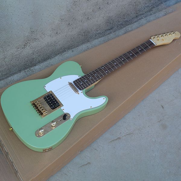 chinese electric guitar fen green color s t gold hardware basswood body rosewood fingerboard 6 strings
chinese electric guitar fen green color s t gold hardware basswood body rosewood fingerboard 6 strings