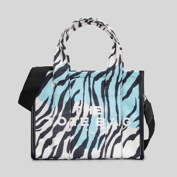 designer the tote bags women striped large capacity portable tote bag cross shoulder bag trendy canvas handbag 220803
designer the tote bags women striped large capacity portable tote bag cross shoulder bag trendy canvas handbag 220803