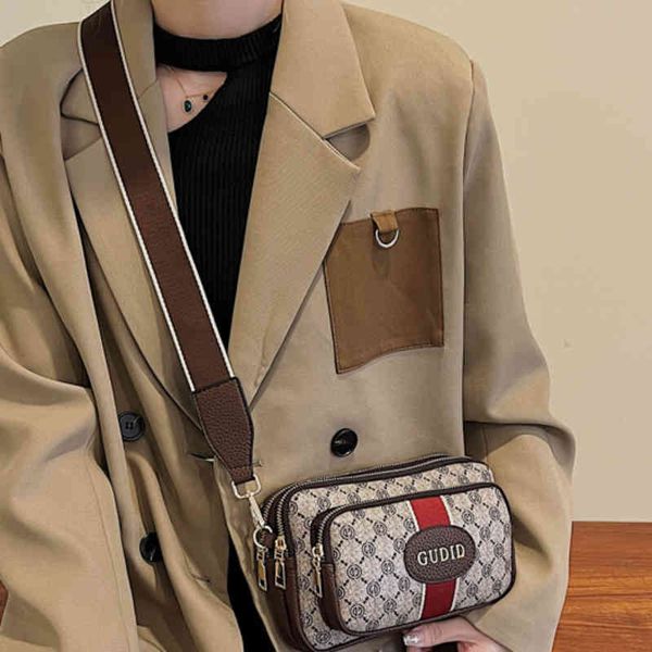 purse sale new fashion printed small square bag multi-layer hand bag color belt flower belt strap shoulder messenger bag
purse sale new fashion printed small square bag multi-layer hand bag color belt flower belt strap shoulder messenger bag