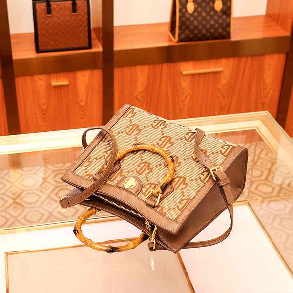 purses outlet 2022 spring new women's bamboo handbag high sense one shoulder messenger tote bag
purses outlet 2022 spring new women's bamboo handbag high sense one shoulder messenger tote bag