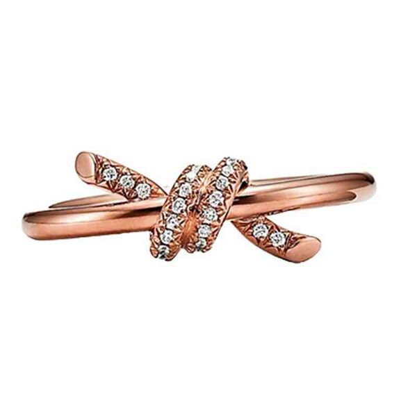 dvk8 t's new fashion knot series double line ring with cross and kink design diamond inlaid couple's, Silver
dvk8 t's new fashion knot series double line ring with cross and kink design diamond inlaid couple's, Silver