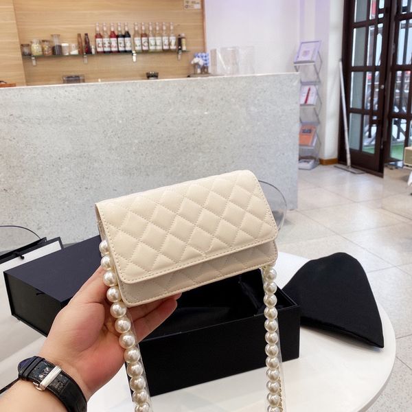 luxury shoulder bags handbag designer classic plaid pearl chain design fashion brand leather ladies versatile elegant black and white messen
luxury shoulder bags handbag designer classic plaid pearl chain design fashion brand leather ladies versatile elegant black and white messen