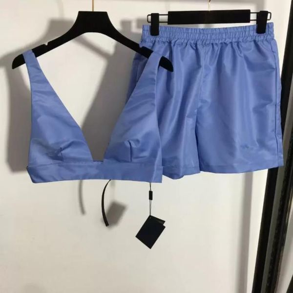 designer loose womens two piece pants set with triangle metal sleeveless v neck vest mini short sets streetwear fashion crop 22ss, White
designer loose womens two piece pants set with triangle metal sleeveless v neck vest mini short sets streetwear fashion crop 22ss, White