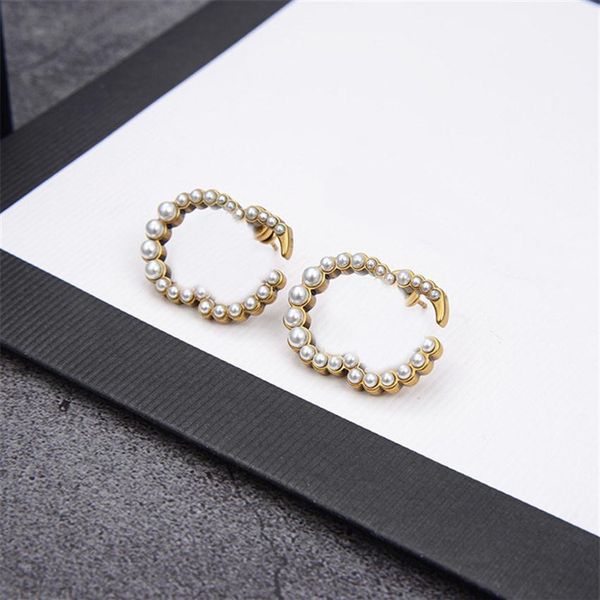 retro pearl charm earrings double letters studs women alphabet designer eardrop for birthday party201y, Golden
retro pearl charm earrings double letters studs women alphabet designer eardrop for birthday party201y, Golden