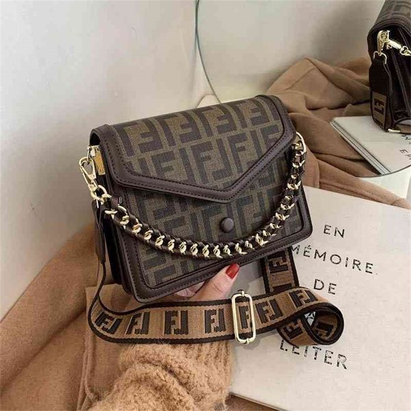 women's summer and winter popular new fashion small square simple broadband single messenger design purses online
women's summer and winter popular new fashion small square simple broadband single messenger design purses online