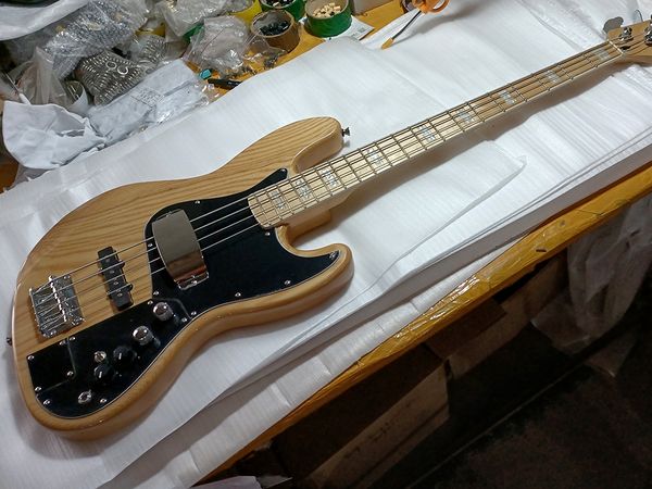 factory custom natural wood color 4 strings electric bass guitar with white pearl inlay black pickguard pickup cover offer customized
factory custom natural wood color 4 strings electric bass guitar with white pearl inlay black pickguard pickup cover offer customized