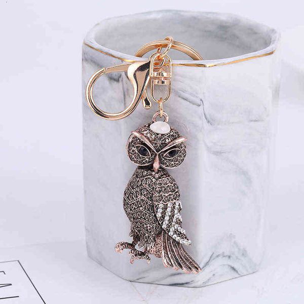 black key chain owl style with shining rhinestone key chain pendant bag ring accories, Slivery;golden
black key chain owl style with shining rhinestone key chain pendant bag ring accories, Slivery;golden