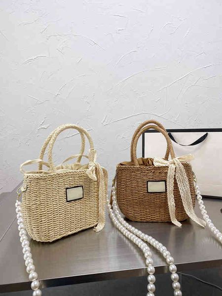 women luxurys designers straw woven bags summer handbags pearl chain female large capacity lady buckets messenger shopping travel beach wall
women luxurys designers straw woven bags summer handbags pearl chain female large capacity lady buckets messenger shopping travel beach wall