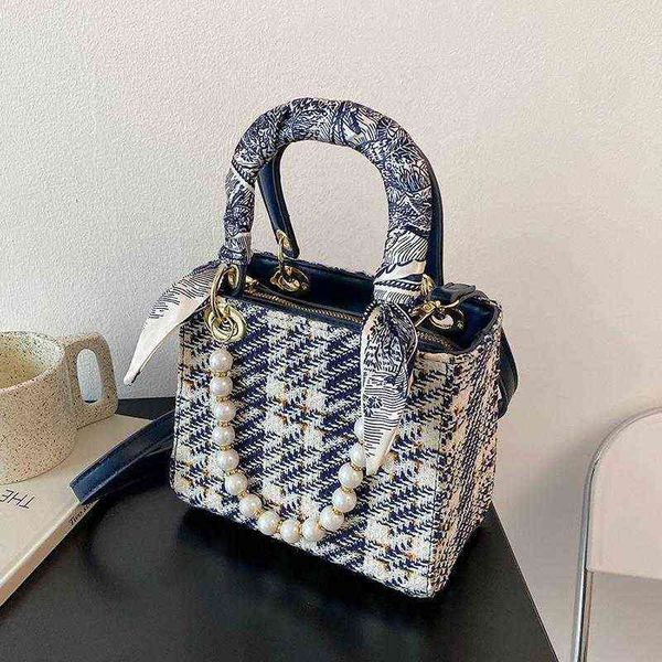 76f3 minority design bag female spring and summer 2022 new fashion silk scarf pearl chain portable bag single shoulder messenger princess ba
76f3 minority design bag female spring and summer 2022 new fashion silk scarf pearl chain portable bag single shoulder messenger princess ba