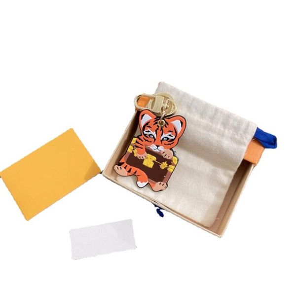 cute tiger pattern key chain buckle lovers car keychain handmade leather designers brand letter keychains men women bag pendant
cute tiger pattern key chain buckle lovers car keychain handmade leather designers brand letter keychains men women bag pendant