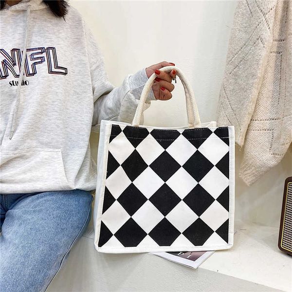 large capacity bag women's bag 2021 autumn new fashion shopping bag korean printed checkered simple handbag
large capacity bag women's bag 2021 autumn new fashion shopping bag korean printed checkered simple handbag