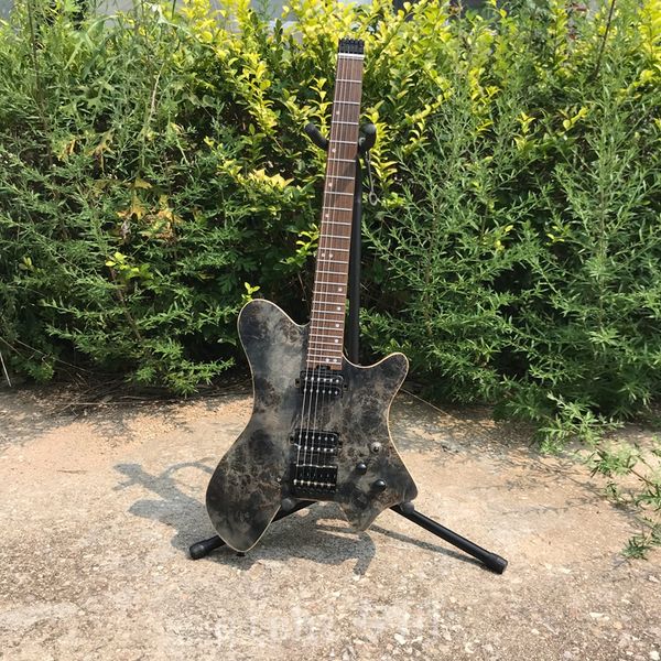 headless electric guitar portable travel guitar stumps veneer pewter xylophone charcoal baked maple 5 spell piano neck stainless steel wire 
headless electric guitar portable travel guitar stumps veneer pewter xylophone charcoal baked maple 5 spell piano neck stainless steel wire