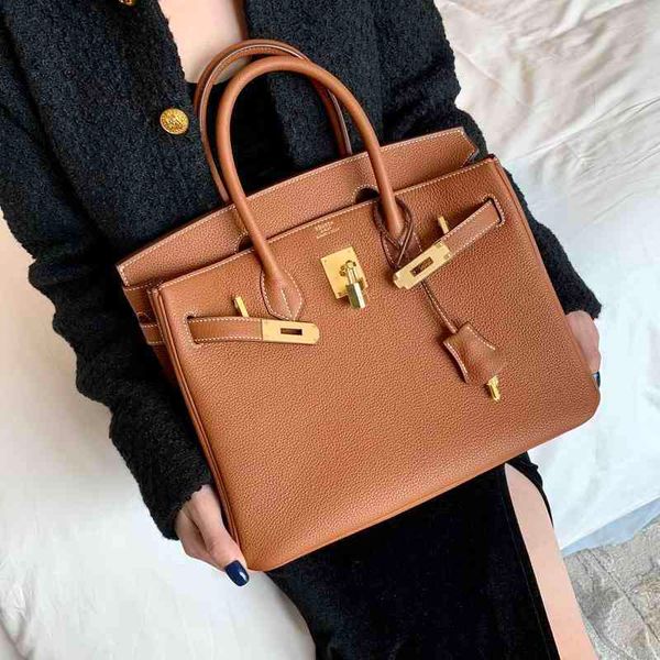 designer herme handbags home platinum bag lock togo leather litchi grain cowhide hand sewn wax thread portable women's bag leisure bag
designer herme handbags home platinum bag lock togo leather litchi grain cowhide hand sewn wax thread portable women's bag leisure bag
