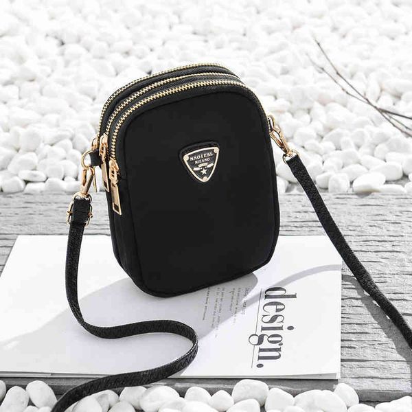 new vertical mobile phone bag mini small bag one shoulder oxford cloth coin purses wallet messenger bag
new vertical mobile phone bag mini small bag one shoulder oxford cloth coin purses wallet messenger bag
