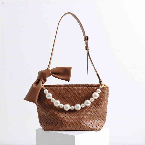 2022 pearl chain designer handbags hand made woven genuine leather fashion bag casual one shoulder handbag women's messenger
2022 pearl chain designer handbags hand made woven genuine leather fashion bag casual one shoulder handbag women's messenger