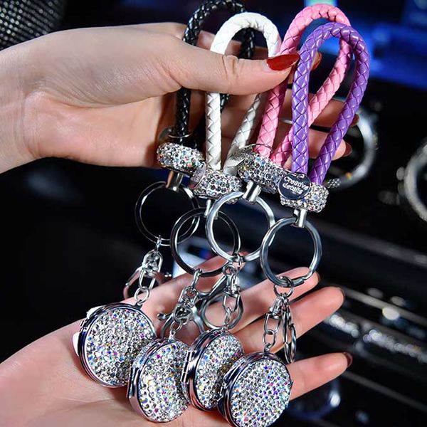 1pcs high-grade hand woven leather car keychain crystal key holder key rings storage genuine bag pendant with mirror
1pcs high-grade hand woven leather car keychain crystal key holder key rings storage genuine bag pendant with mirror