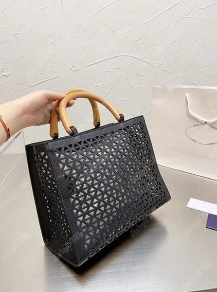 luxury fashion ladies hollow-carved designer bag classic high-end quality genuine leather shopping bags carved tote shoulder summer traval b
luxury fashion ladies hollow-carved designer bag classic high-end quality genuine leather shopping bags carved tote shoulder summer traval b