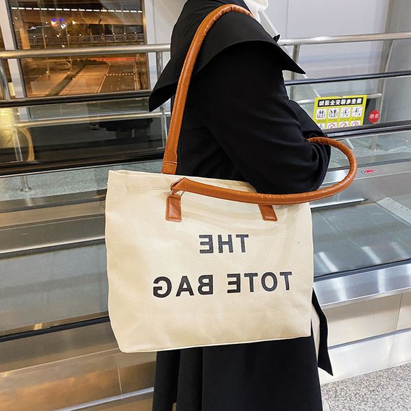 designer bags 2022 new canvas large capacity women's foreign style versatile shoulder texture fashion portable letter tote
designer bags 2022 new canvas large capacity women's foreign style versatile shoulder texture fashion portable letter tote