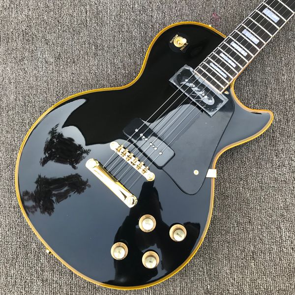 custom lp electric guitar, gold hardware, 2 p90 pickups, yellow binding, rosewood fingerboard, black solid mahogany body guitar
custom lp electric guitar, gold hardware, 2 p90 pickups, yellow binding, rosewood fingerboard, black solid mahogany body guitar