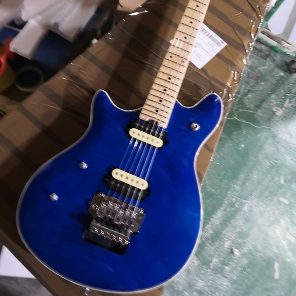 6 strings left handed blue electric guitar with quilted maple veneer maple fretboard
6 strings left handed blue electric guitar with quilted maple veneer maple fretboard
