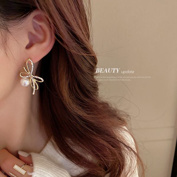 silver needle pearl diamond bow earrings korean dongdaemun personalized and temperamental eardrops niche high-grade earrings for women, Golden
silver needle pearl diamond bow earrings korean dongdaemun personalized and temperamental eardrops niche high-grade earrings for women, Golden