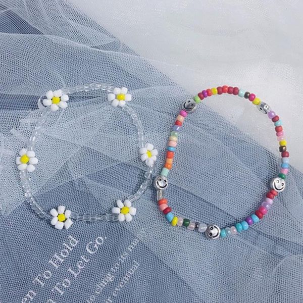 boho smiley flower clear acrylic strand handmade beads bracelet on hands daisy, Black
boho smiley flower clear acrylic strand handmade beads bracelet on hands daisy, Black