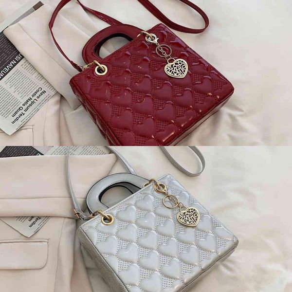 embroidered thread female fashion style bag versatile high-grade texture one shoulder small square bag
embroidered thread female fashion style bag versatile high-grade texture one shoulder small square bag