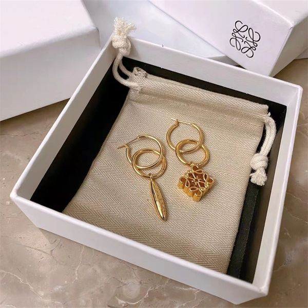 moon cake warhead double ring asymmetric earrings women's simple earrings, Golden
moon cake warhead double ring asymmetric earrings women's simple earrings, Golden