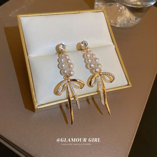 real gold electroplated silver stud rhinestone-encrusted pearl zircon bow earrings korean design light luxury earrings fashion eardrop, Golden
real gold electroplated silver stud rhinestone-encrusted pearl zircon bow earrings korean design light luxury earrings fashion eardrop, Golden