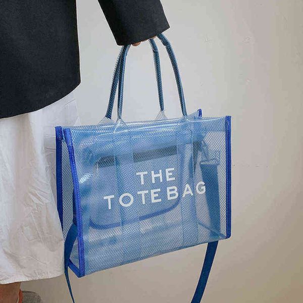 the tote bag transparent jelly shopping bag korean transparent beach handbag concave shape portable messenger bag 220617
the tote bag transparent jelly shopping bag korean transparent beach handbag concave shape portable messenger bag 220617