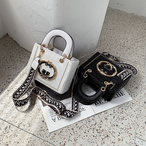 new designer bags handbag women's small fragrance 2022 rivet hand carry fashion versatile square bag
new designer bags handbag women's small fragrance 2022 rivet hand carry fashion versatile square bag