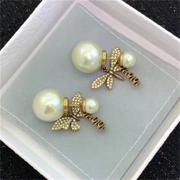 2022 fashion 20% off designer d di butterfly dragonfly asymmetric pearl female earrings 925 silver needle jewelry, Golden
2022 fashion 20% off designer d di butterfly dragonfly asymmetric pearl female earrings 925 silver needle jewelry, Golden
