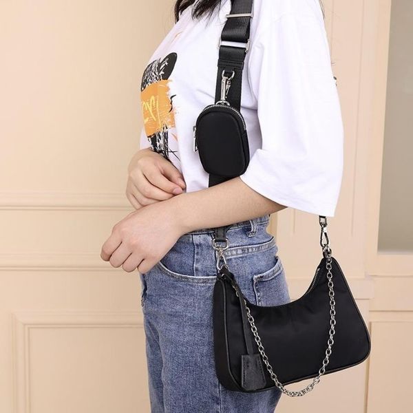 2022luxurys handbags bag crossbody heart-shaped decoration tarpaulin nylon purse wholesale shopping bags
2022luxurys handbags bag crossbody heart-shaped decoration tarpaulin nylon purse wholesale shopping bags