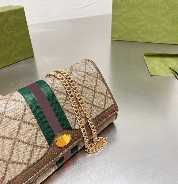 9a new luxury messenger bag fashion clutch chain handbag brand name womens wallet and coin purse canvas pu material with multiple s shoulder
9a new luxury messenger bag fashion clutch chain handbag brand name womens wallet and coin purse canvas pu material with multiple s shoulder