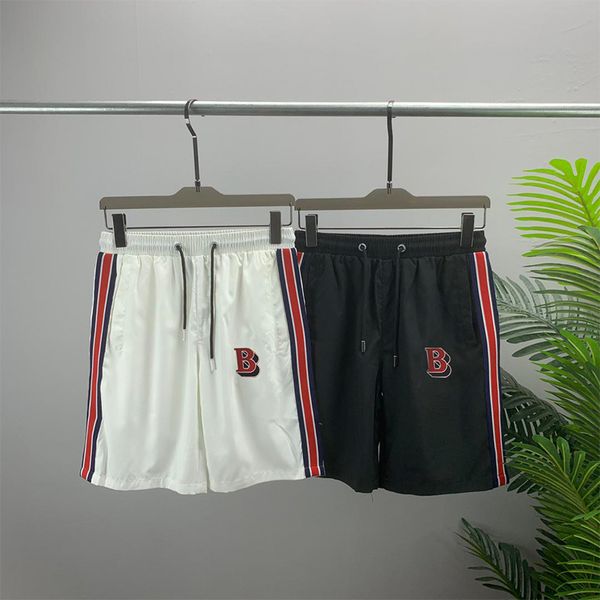men's beach pants shorts 2022 new casual elastic tie letter printed loose comfy side stitching black white wholesale and retail, White;black
men's beach pants shorts 2022 new casual elastic tie letter printed loose comfy side stitching black white wholesale and retail, White;black