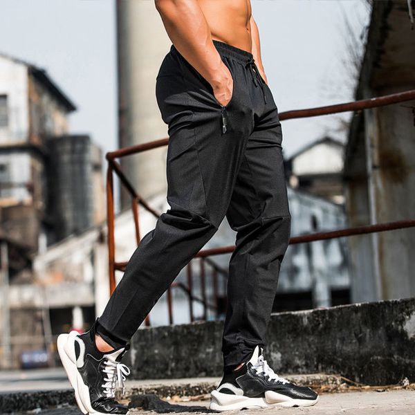 thin summer men running pants sports training with zipper pockets casual trousers jogging fitness gym workout sport 220719, Black 
thin summer men running pants sports training with zipper pockets casual trousers jogging fitness gym workout sport 220719, Black