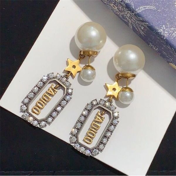 ornament charm earring letter diamond inlaid front and rear pearl earrings brass 925 silver needle red earrings, Golden
ornament charm earring letter diamond inlaid front and rear pearl earrings brass 925 silver needle red earrings, Golden