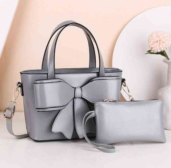 high-quality bowknot two-piece female bag 2021 new european american fashion handbag simple temperament shoulder messenger bag g220420
high-quality bowknot two-piece female bag 2021 new european american fashion handbag simple temperament shoulder messenger bag g220420