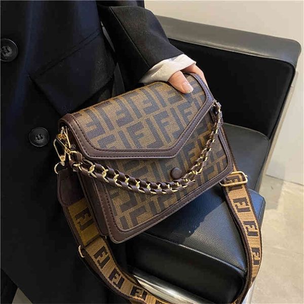 new women's fashion versatile wide strap small square single messenger portable design purses online
new women's fashion versatile wide strap small square single messenger portable design purses online