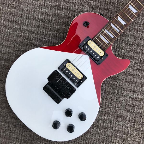 rosewood fingerboard electric guitar, double tremolo bridge, solid mahogany body 
rosewood fingerboard electric guitar, double tremolo bridge, solid mahogany body