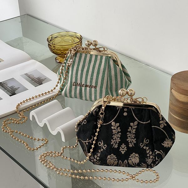 retro crossbody bag evening bag clutch shoulder senior sense of women's bags stripes mouth gold
retro crossbody bag evening bag clutch shoulder senior sense of women's bags stripes mouth gold