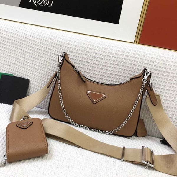luxury bags re-edition 2005 re-nylon bag saffiano trim totes removable chain handle detachable adjustable -print woven nylon shoulder strap
luxury bags re-edition 2005 re-nylon bag saffiano trim totes removable chain handle detachable adjustable -print woven nylon shoulder strap