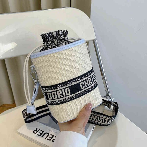 mini summer new creative personality wide shoulder strap contrast letter cylinder woven mini bag
mini summer new creative personality wide shoulder strap contrast letter cylinder woven mini bag