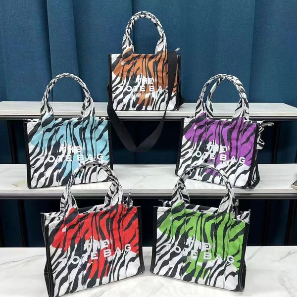 envelope canvas lady bag op31 handbag luxury designer swing bag stripe shopping pocket square european and american fashion brand
envelope canvas lady bag op31 handbag luxury designer swing bag stripe shopping pocket square european and american fashion brand