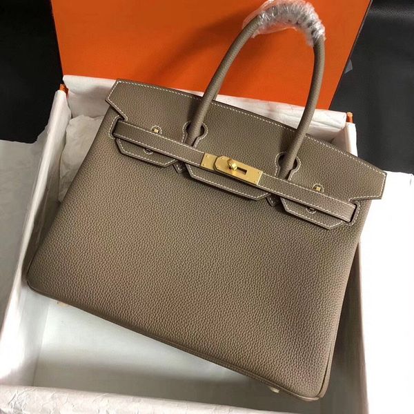 7a r bags togo handbag litchi grain cowhide classic fashion handmade big bag women's genuine leather bag luxury custom made no
7a r bags togo handbag litchi grain cowhide classic fashion handmade big bag women's genuine leather bag luxury custom made no