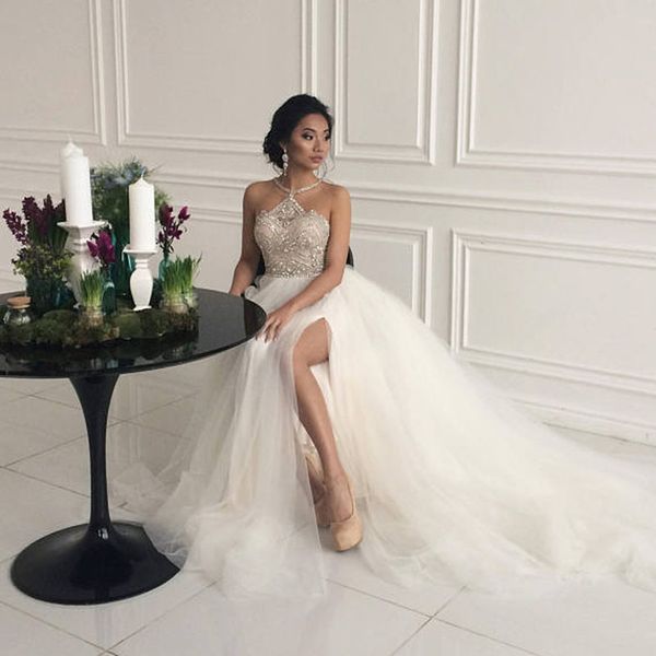 2022 dubai beach sleeveless crystal beaded wedding dresses halter aline tulle high split bridal gowns robe de mariee bc5706, White
2022 dubai beach sleeveless crystal beaded wedding dresses halter aline tulle high split bridal gowns robe de mariee bc5706, White