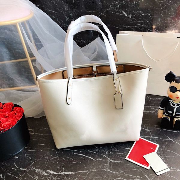 hand embroidered fashion shopping bag super practical style one shoulder handbag classic mommy bag
hand embroidered fashion shopping bag super practical style one shoulder handbag classic mommy bag