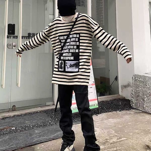 style males hoodies raf simons black and white striped long-sleeved high street slogan patch loose shoulder knit round neck sweater
style males hoodies raf simons black and white striped long-sleeved high street slogan patch loose shoulder knit round neck sweater